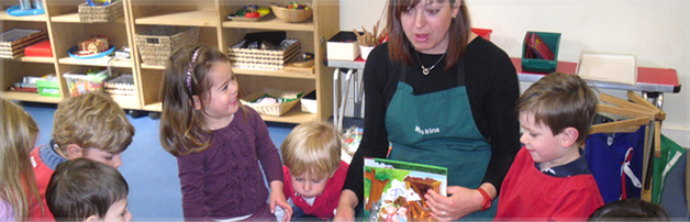 Kids having fun with their teacher